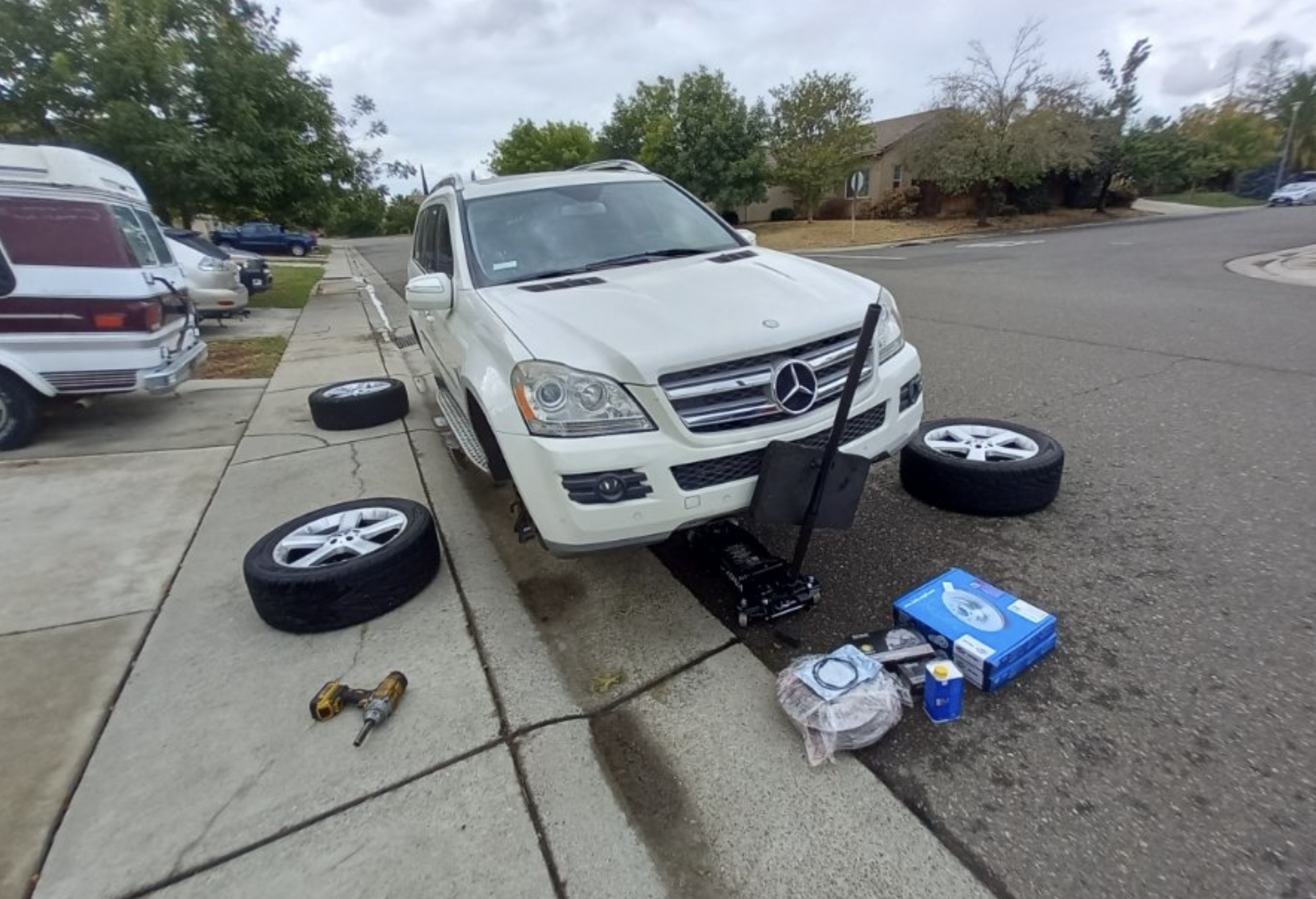 Houston-mobile-auto-repair this image shows onsite brake service in Houston, TX